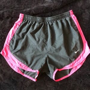 Black and pink built in underwear Nike shorts.